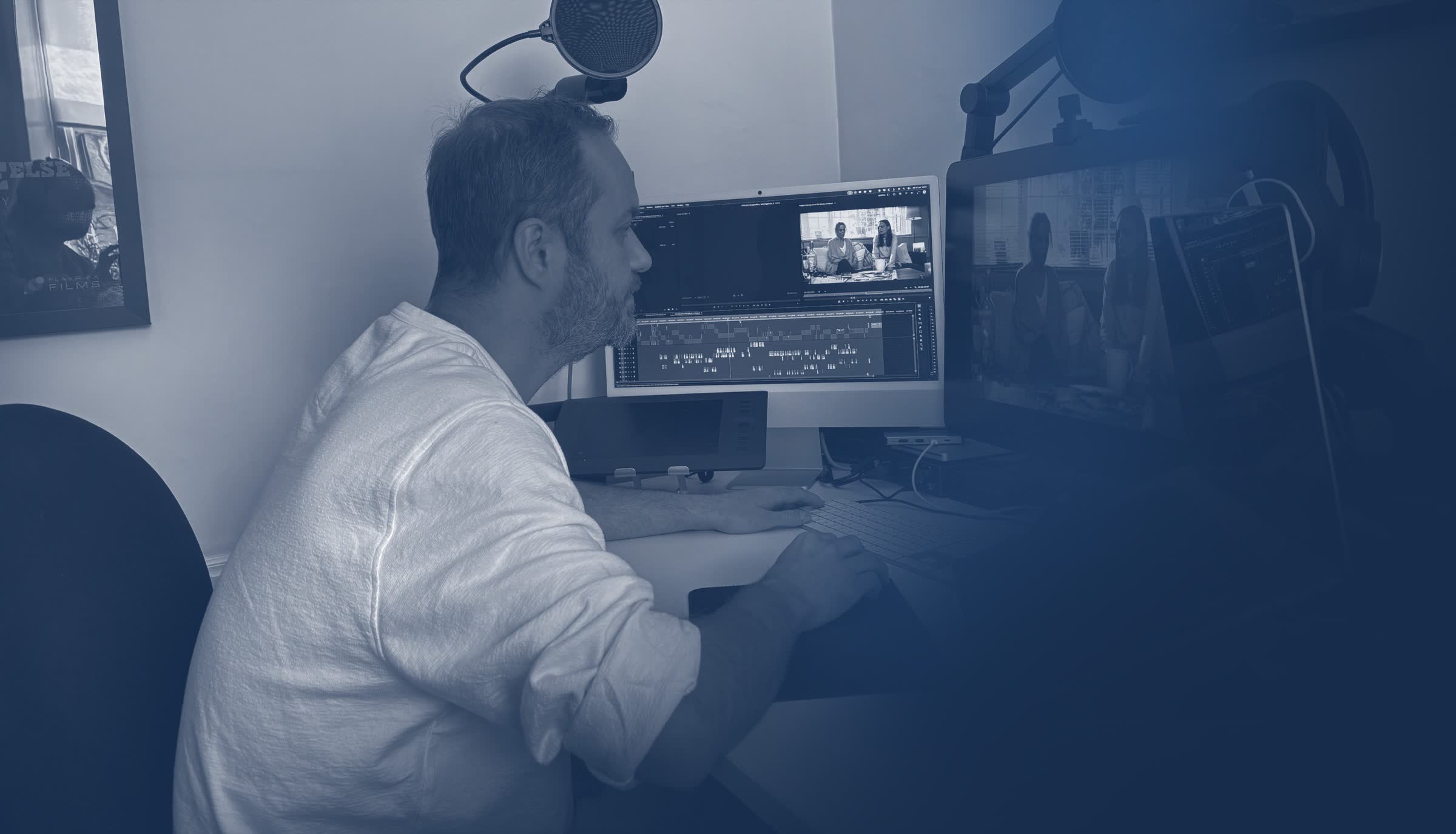 Jamie Steedman at work in the edit suite, a timeline on the monitor in front of him