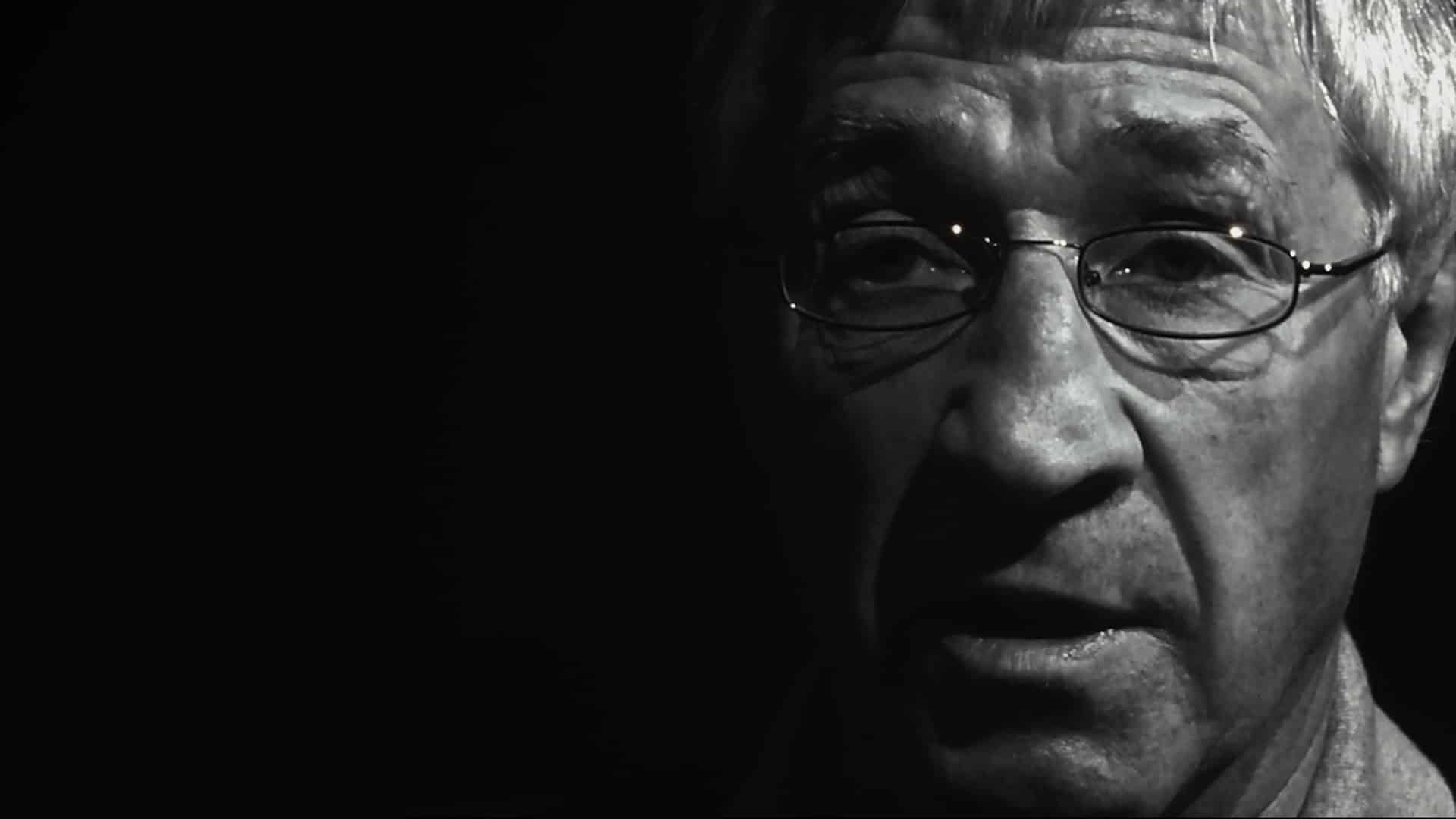 Ken Buchanan in close-up, lit from the side against black