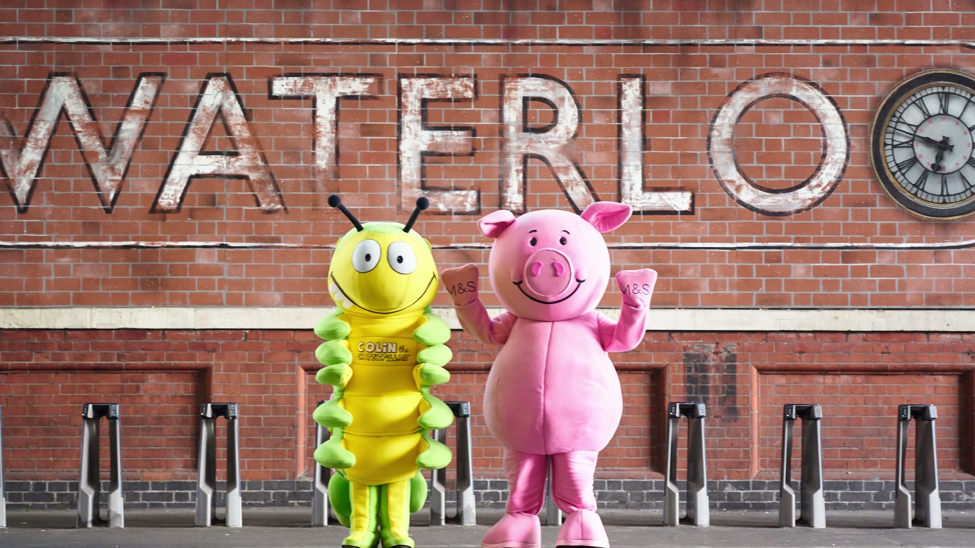 Percy Pig and Colin the Caterpillar at an M&S Food store opening at Waterloo